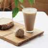 Photo of Custom Engraved Aesthetic ChopValue Charcuterie Board with ice coffee and pastries.
