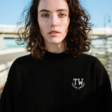 Woman wearing custom embroidered sweatshirt with custom monogrammed initials